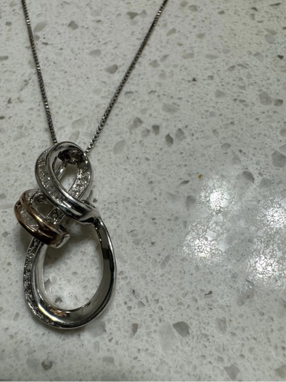 DIAMOND 1/10 CTTW Sterling Silver and Rose Gold Swirl Pendant